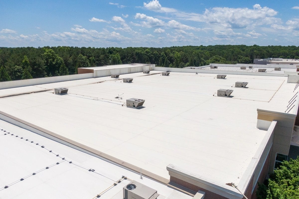 Before and after GAF TPO flat roof replacement