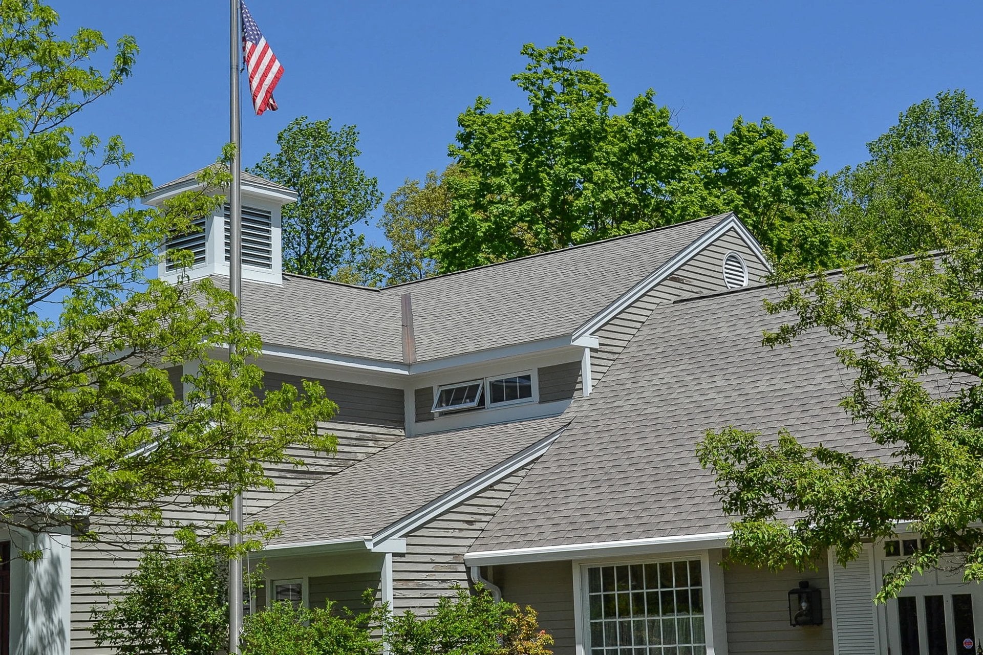 Charcoal architectural shingles on modern home
